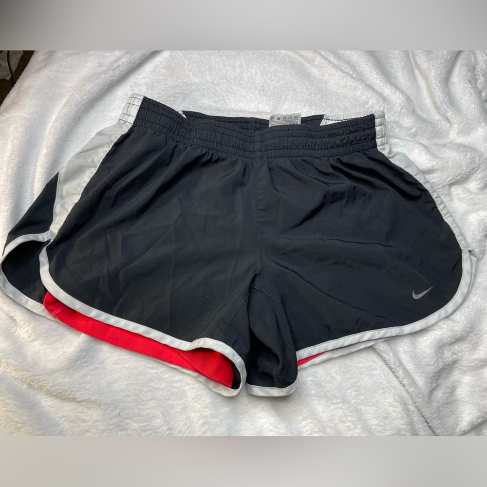 Nike women’s athletic shorts, size medium.